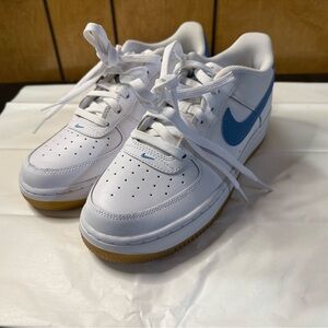 Nike Kids White Sneakers with Blue Swoosh and Gum Sole
